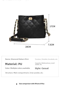 Nahaufnahme der schwarzen gesteppten PU-Ledertasche mit goldenem Verschluss und Kette