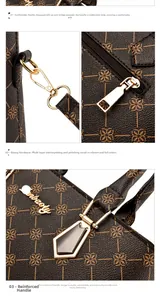 Detailed view of reinforced handles and polished gold hardware on brown monogram handbag