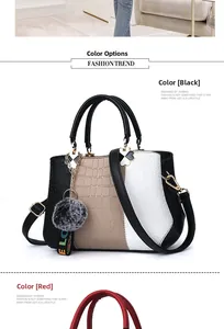 Detail of color-block stone pattern handbag with fur ball and LOVE charm