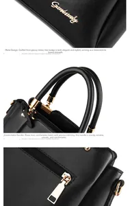Detail of glossy hardware logo and precision-stitched handles on black bucket bag