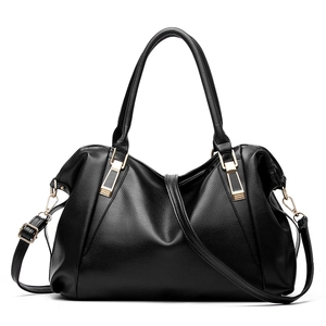 Black pebbled leather tote bag with gold hardware and adjustable shoulder strap for women