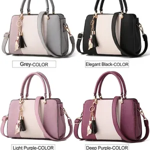 Chic tricolor leather handbags for women in black, grey, and purple with cat charm detail