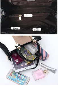 Detail view of interior compartments showing capacity for tablets and daily items