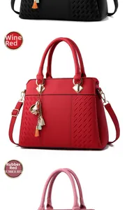 Detailed comparison of leather tote bags in Black, Wine Red, and Rubber Red finishes