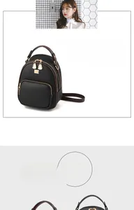 Close-up of black litchi texture PU leather backpack with brown contrast straps and gold zippers