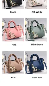 Detail view of floral embroidery handbag showing six color options with woven handles
