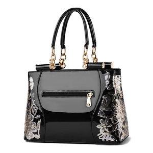 Retro black patent leather handbag with floral sequins embroidery and gold chain details