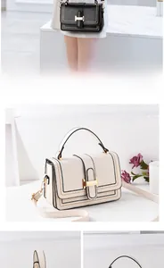 Detail view of leather crossbody square bag with H-buckle and contrast stitching