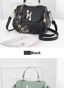 Detailed embroidery daisy pattern and pearl hardware latch on black PU leather handbag