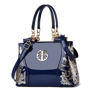 Retro deep blue patent leather tote bag with gold floral sequins and tree logo detail