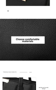 Detail showing the comfortable lychee grain leather and reinforced handle of this black bag