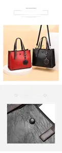 Detail view of the pebbled leather texture and decorative round buckle on women's tote bag