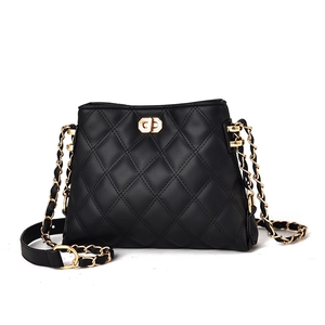Classic black quilted leather tote bag with gold chain strap and turn-lock closure