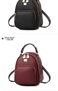 Vertical view of black and burgundy textured leather backpacks with gold hardware and zippers