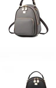 Mini lychee texture backpack in gray and black with metal zippers and branding detail