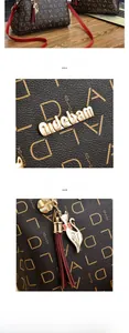Détail d'un sac en cuir monogramme avec garnitures dorées et pendentif chat décoratif