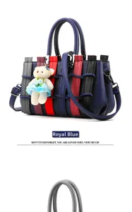 Sapphire blue woven handbag with color-block stripes and a cute bear keychain detail