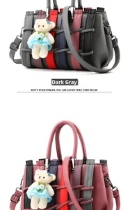 Detail view of woven leather texture and cute bear pendant on grey and magenta handbags
