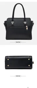 Détails du sac à main noir avec poche zippée arrière et pieds de protection métalliques