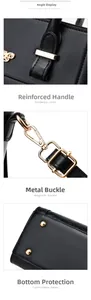 Détails du sac à main en cuir noir avec décor papillon doré et rivets métalliques au fond
