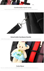 Detail of color-block tote featuring hardware clasps and a plush bear pendant