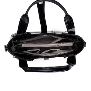 Top view of large black crocodile embossed handbag showing multiple interior compartments