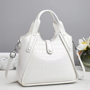 White crocodile embossed tote bag with top handles and adjustable strap for women