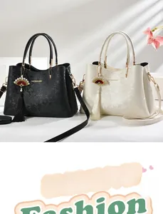 Detailed close-up of retro jacquard handbags with golden hardware and tassel charms