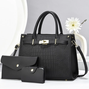Three-piece elegant black crocodile pattern handbag set with golden hardware and accessories