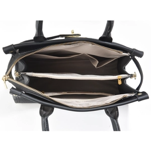 Three-piece black crocodile pattern handbag set with multiple interior compartments and gold zippers