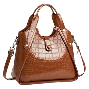 Brown crocodile embossed faux leather tote bag with top handles and adjustable shoulder strap