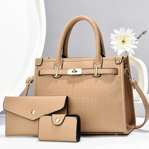 Three-piece set with large tote bag, clutch and card holder in beige faux leather