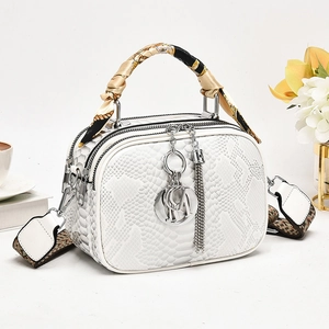 White snakeskin embossed leather tote bag with silk scarf handle and wide shoulder strap