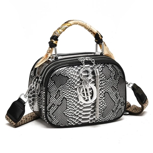 Python snakeskin pattern handbag with silk scarf and patterned wide shoulder strap