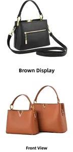 Détails de sacs en cuir grainé avec boucle en V dorée en coloris noir et marron