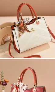 Close-up of embossed wave texture and gold hardware on these elegant women handbags