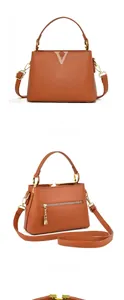 Sac à main en cuir marron avec logo V doré et bandoulière réglable sous trois angles