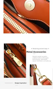 Detailed close-up of golden metallic hardware and leather texture on a red handbag