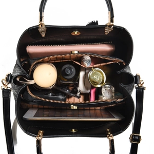 Black leather tote bag with large capacity interior and multiple functional compartments