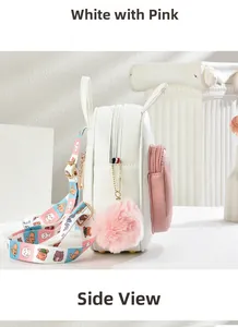 Side detail of white leather kids backpack with pink pocket, rabbit ears, and pompom
