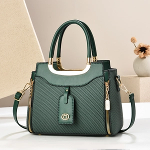 Dark green woven texture handbag with gold metal handle and long crossbody strap