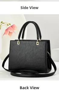 Detailed side view of black lychee grain leather tote bag with elegant gold hardware