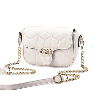 Elegant white quilted chain handbag with golden hardware and hexagonal stitching pattern