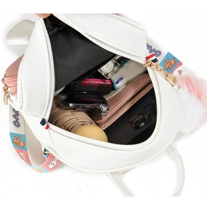 Mini white leather backpack for girls with rabbit straps showing inner storage capacity