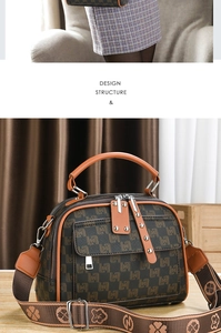 Détail du sac bandoulière vintage monogramme avec bordure en cuir marron et large sangle