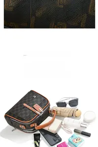 Détail du sac à main vintage montrant une grande capacité pour téléphone et accessoires