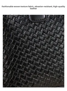 Detailed close-up of premium black woven leather texture with scratch-resistant finish