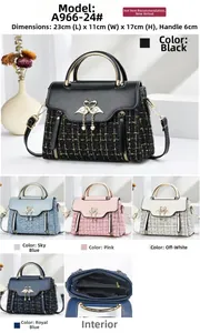Detail view of woven texture handbag with metal swan buckle and size 23x11x17cm
