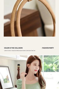 Detail of yellow stitching on brown leather handbag with lifestyle lifestyle model shot