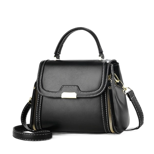 Black leather small square handbag with white contrast stitching and gold-tone hardware
